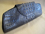 Handmade Black Hornback American Alligator Clutch Flap Bag. 11.5"W X 6.5"H X 2.0"D.  Black Ostrich Lining. Hand Stitched.  Magnetic Closure. PHD Logo ID Tag. (Front View)
