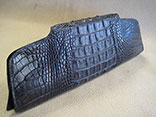 Handmade Black Hornback American Alligator Clutch Flap Bag. 11.5"W X 6.5"H X 2.0"D.  Black Ostrich Lining. Hand Stitched.  Magnetic Closure. PHD Logo ID Tag. (Back View)