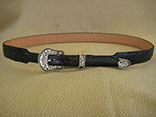 Handmade Black Ostrich Belt w/Hand Sewn Black Glazed Finish Alligator Billets.  1.25" Tapered To 1 3/4".  Vogt 3 Piece Sterling Silver Buckle Set.