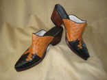 Handmade Cognac Ostrich Mules w/Black Ostrich Fancy Wing-Tip.  Hand Stacked Leather 2.5” Heel w/Dark Finish.